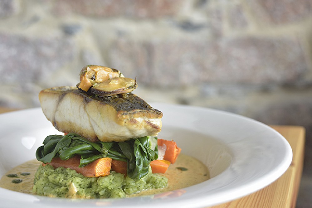 Garden herb mash, pan roasted cod, roasted carrot, garden spinach & dill sauce